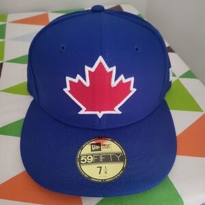 New Era Blue Cap with Red Maple Leaf